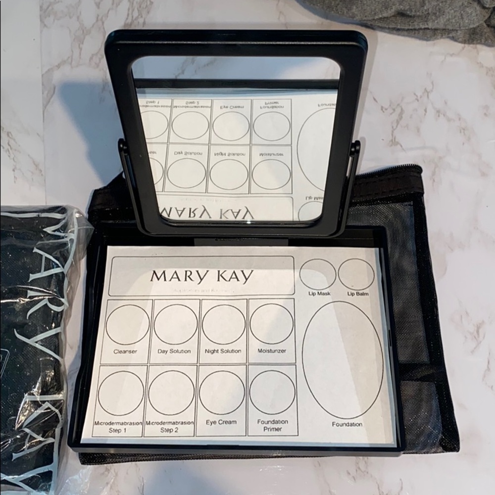 Mary Kay mirror and zip container. New in bag!!